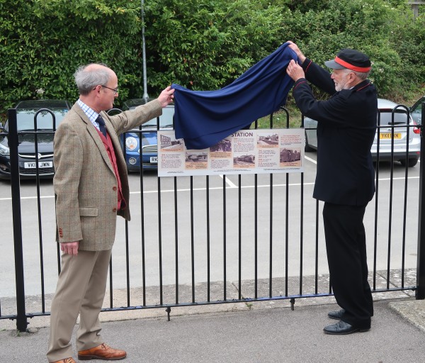 Unveiling of the new information board by Christopher Parker of the Geeening Lamborn Trust and Nicholas Lawrence of Radley History Club