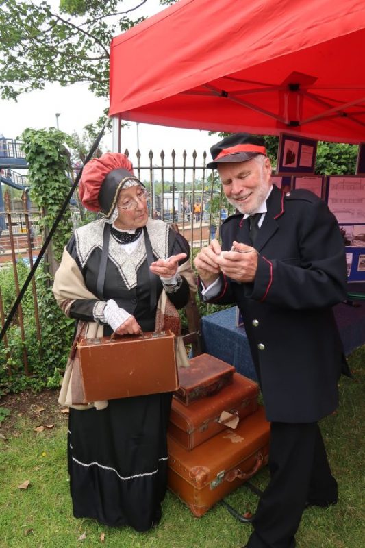 Polly Mountain and Nicholas Lawrence in Victorian costume at Radley History Club's stall to celebrate the 175th Anniversary of the Didcot-Oxford railway line on 15 June 2019