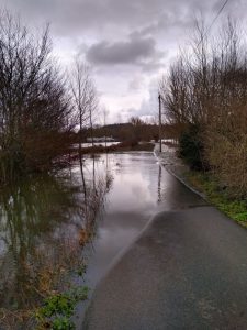 Partially flooded causeway down to the River Thames, January 2021