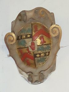 The village emblem is a modern representation of a 17th century shield on the wall in the chancel of Radley Church